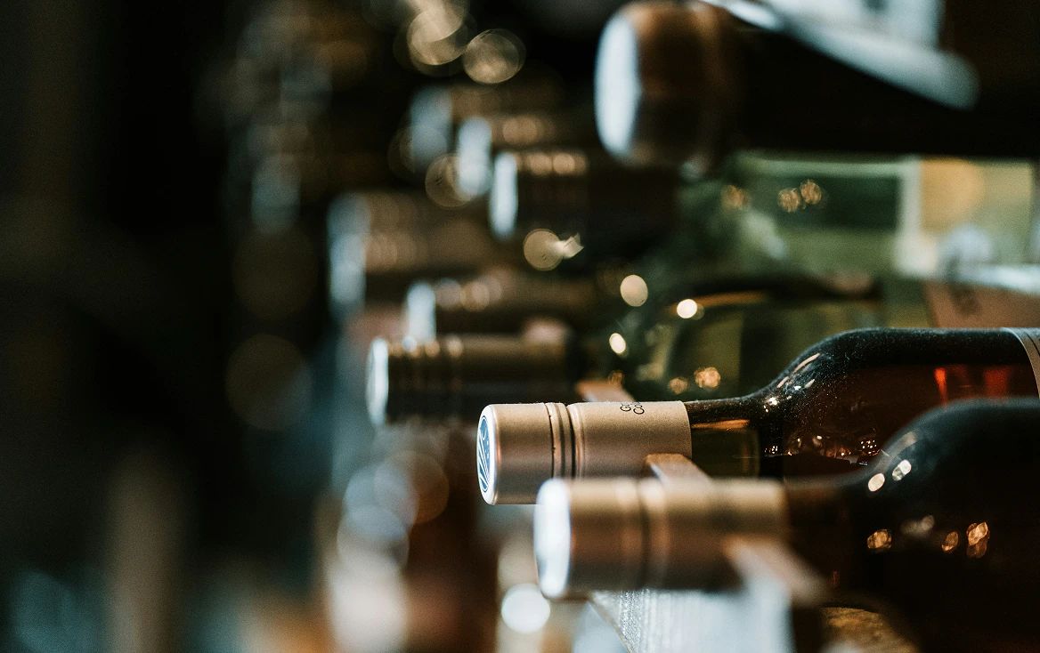 Wine bottles stacked in a Storage Choice Albion wine storage rack